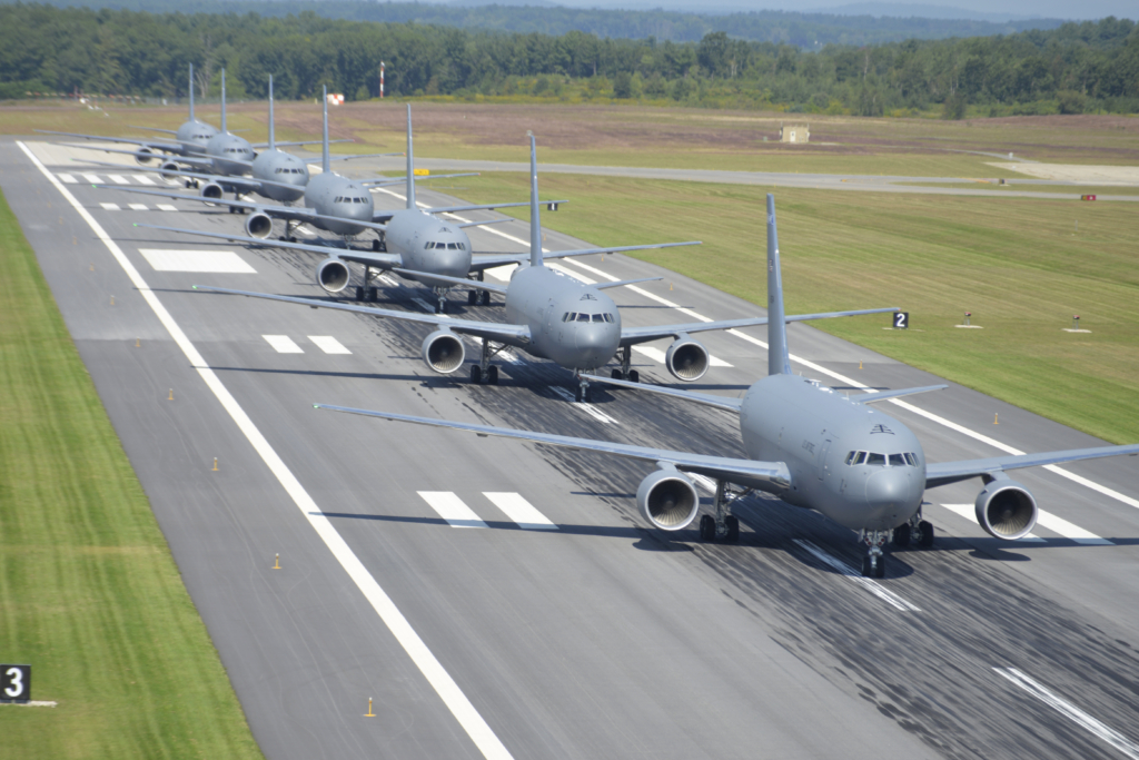Eight KC-46A tankers from the 157th ARW perform an elephant walk formation on the runway at Pease ANGB, New Hampshire, on September 8, 2021
