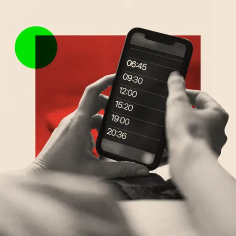BBC A person holds a phone screen showing multiple sets of alarms