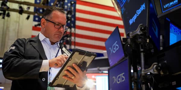 Stocks end higher buoyed by light inflation data, bounce in chip stocks