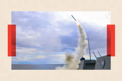Getty Images A Tomahawk being fired from a US vessel at sea