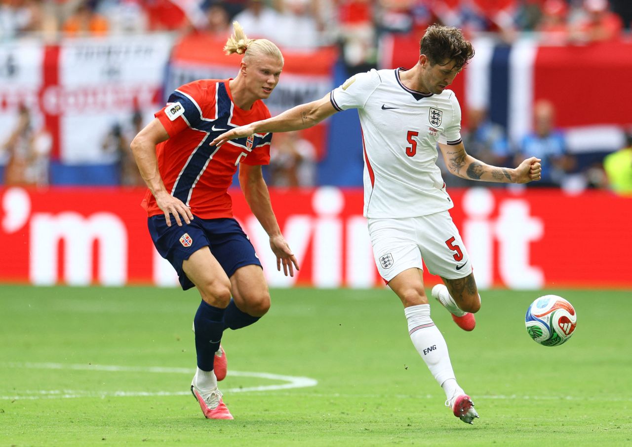 England's John Stones in action with Norway's Erling Haaland.