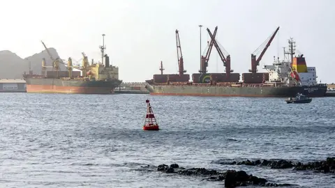 AFP via Getty Images Vessels carrier standing still in ocean water