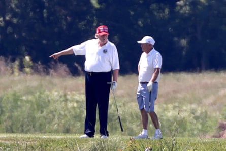 Lindsey Graham, right, with Donald Trump playing golf in Virginia, 2020.