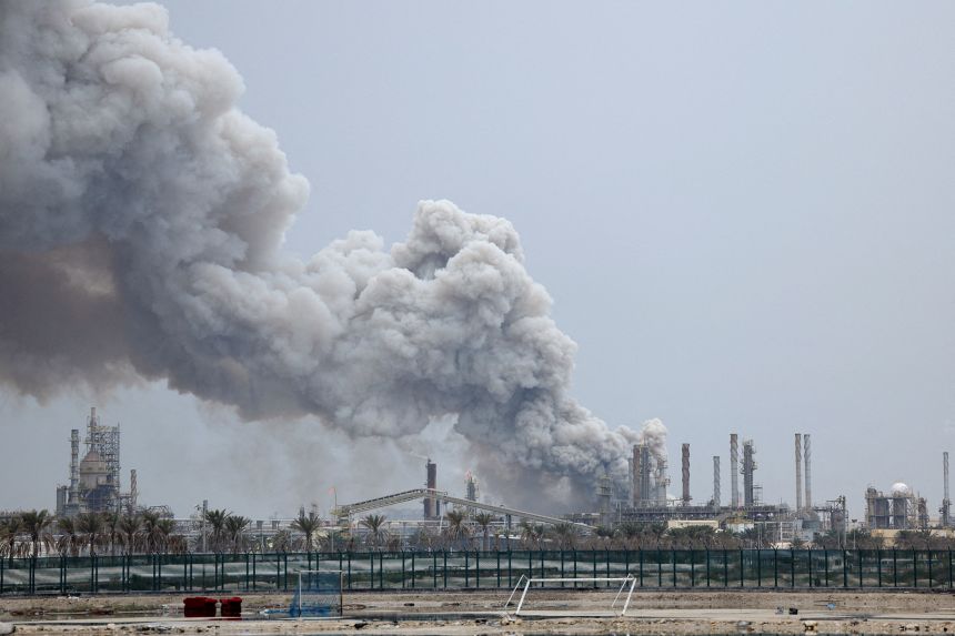 Smoke rises following a strike on the Bapco Oil Refinery, amid the US-Israeli conflict with Iran, on Sitra Island, Bahrain, on March 9, 2026.