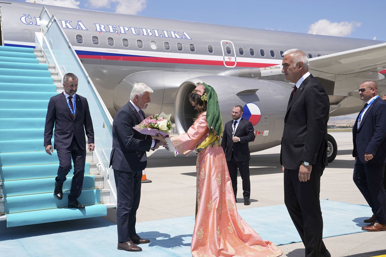 Czech President Petr Pavel is welcomed by the Turkish Minister of Culture and Tourism Mehmet Nuri Ersoy at Esenboga Airport on Tuesday.