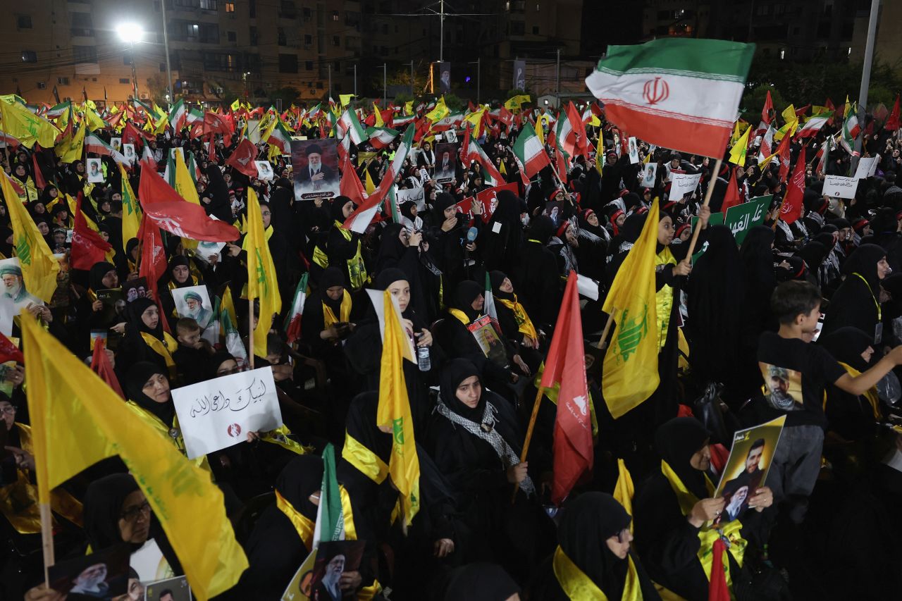 People, including Hezbollah supporters, gather to mourn Iran's late Supreme Leader Ayatollah Ali Khamenei in the southern suburbs of Beirut, Lebanon, on July 8.