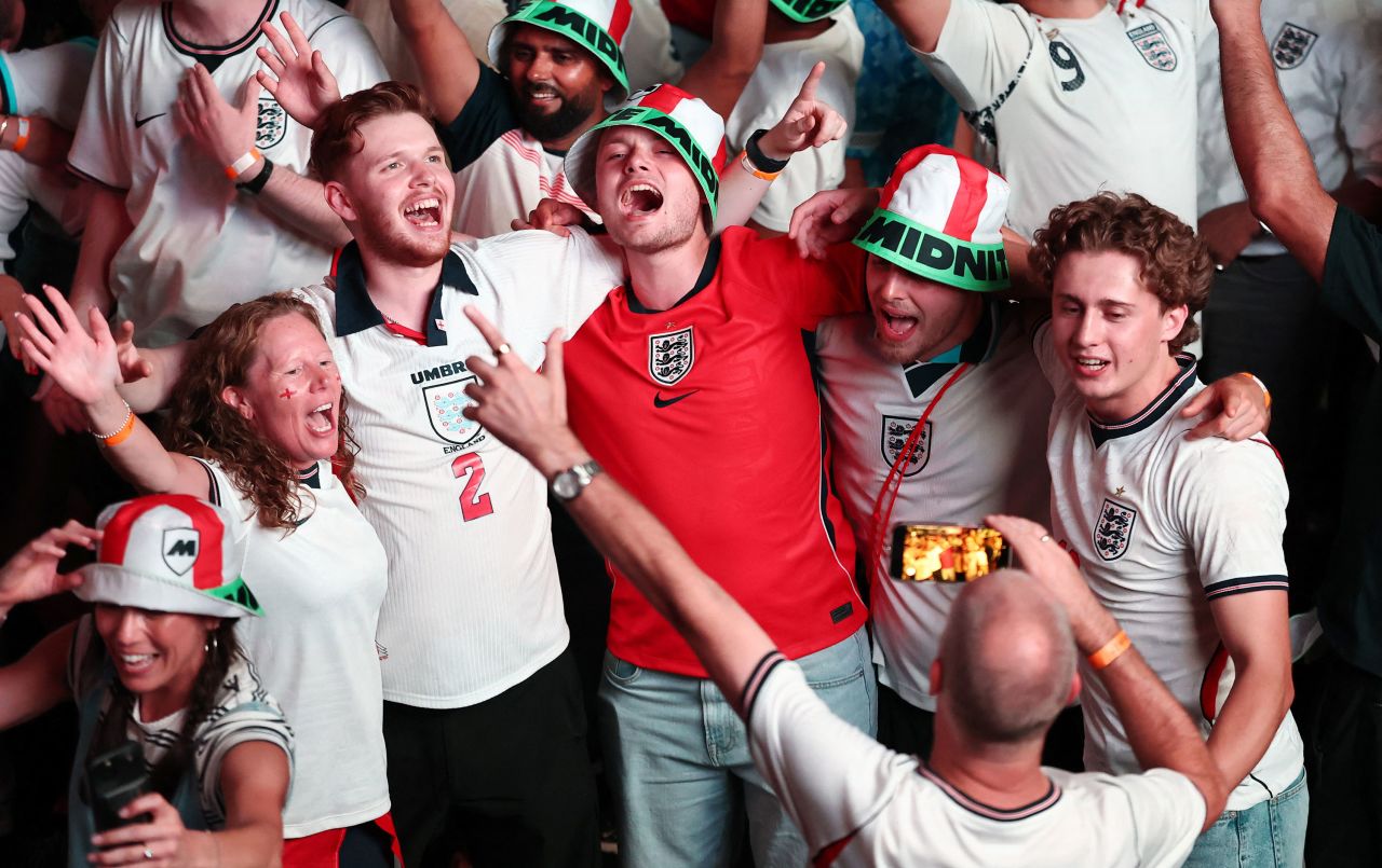 England supporters celebrate in London.