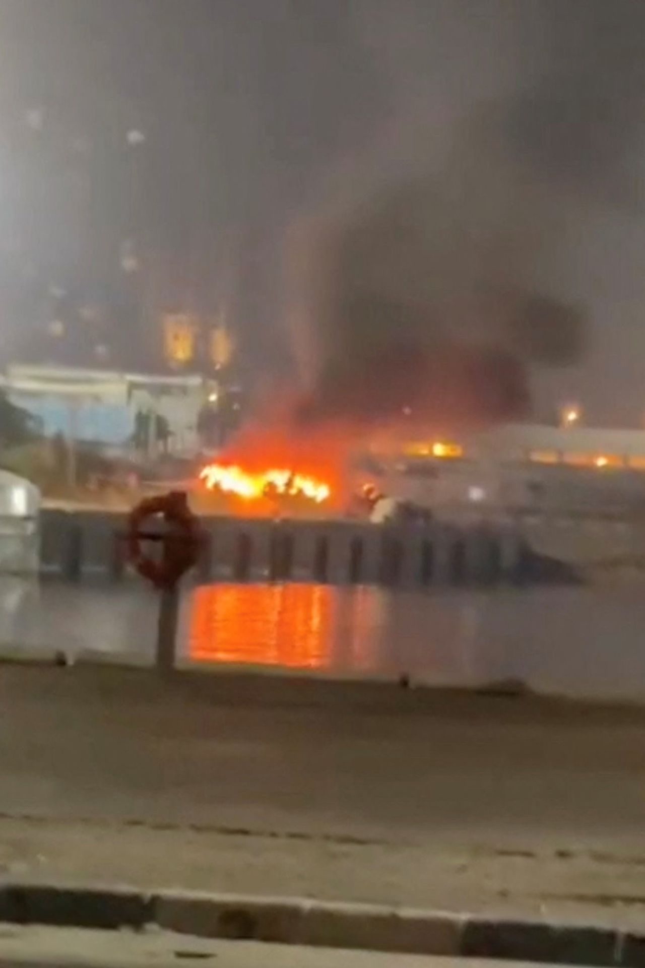 A fire burns at the port of Kish Island in Iran, in this screen grab taken from a social media video released on July 14.