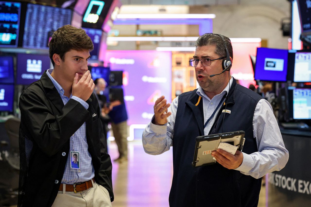 Traders work on the floor of the New York Stock Exchange on Tuesday.