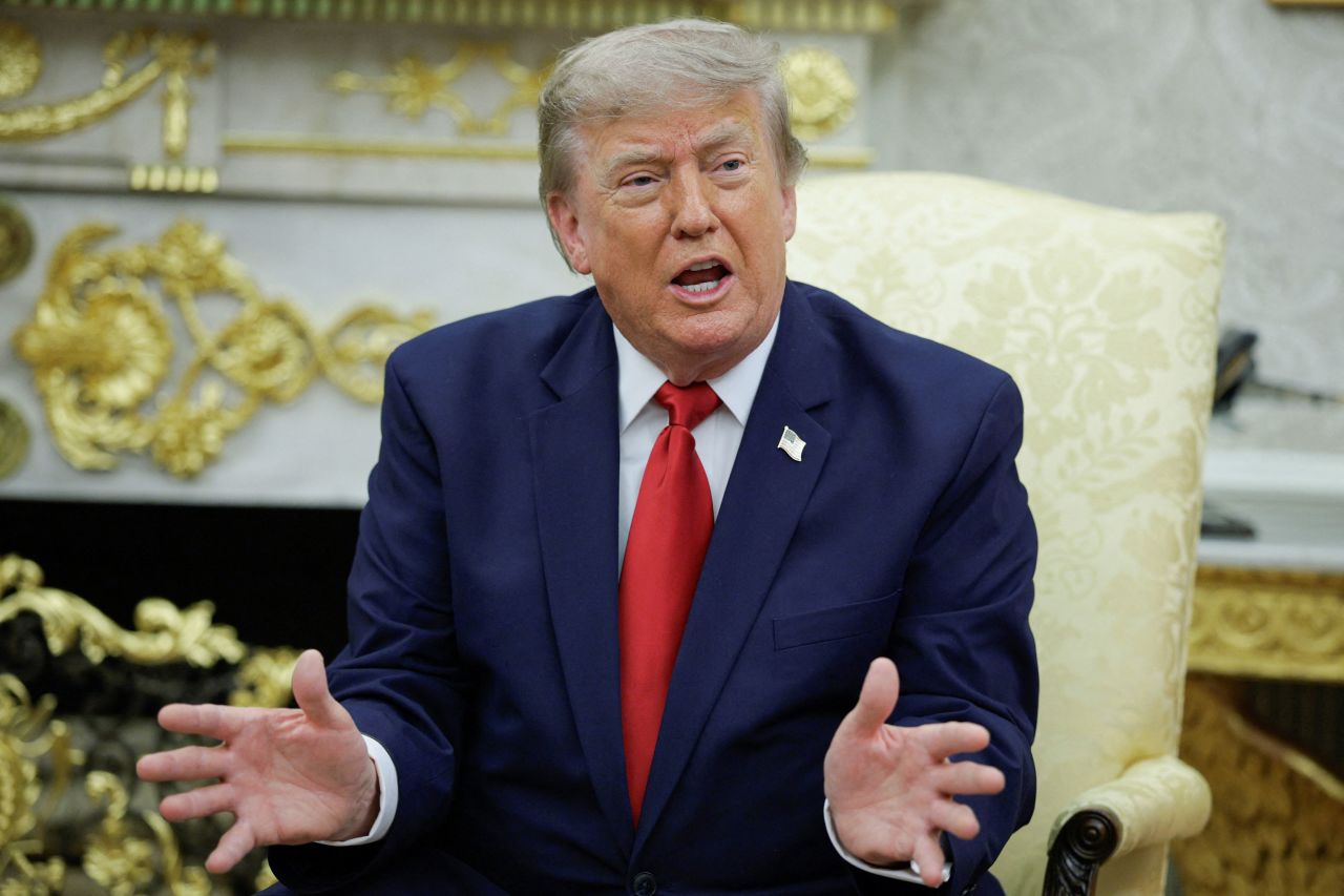 US President Donald Trump gestures as he participates in a bilateral meeting with Iraqi Prime Minister Ali al-Zaidi (not pictured) in the Oval Office at the White House in Washington, DC, on July 14.