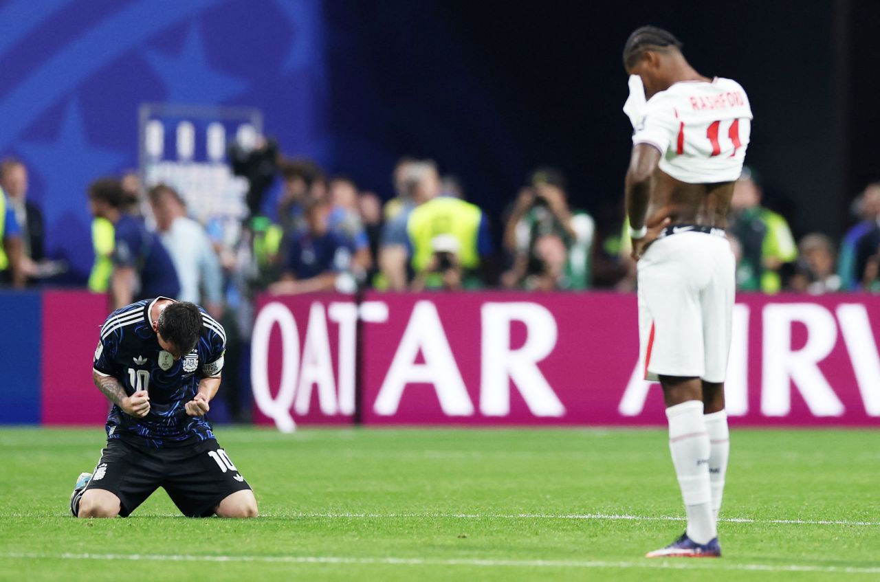 Argentina's Lionel Messi celebrates after the full-time whistle.