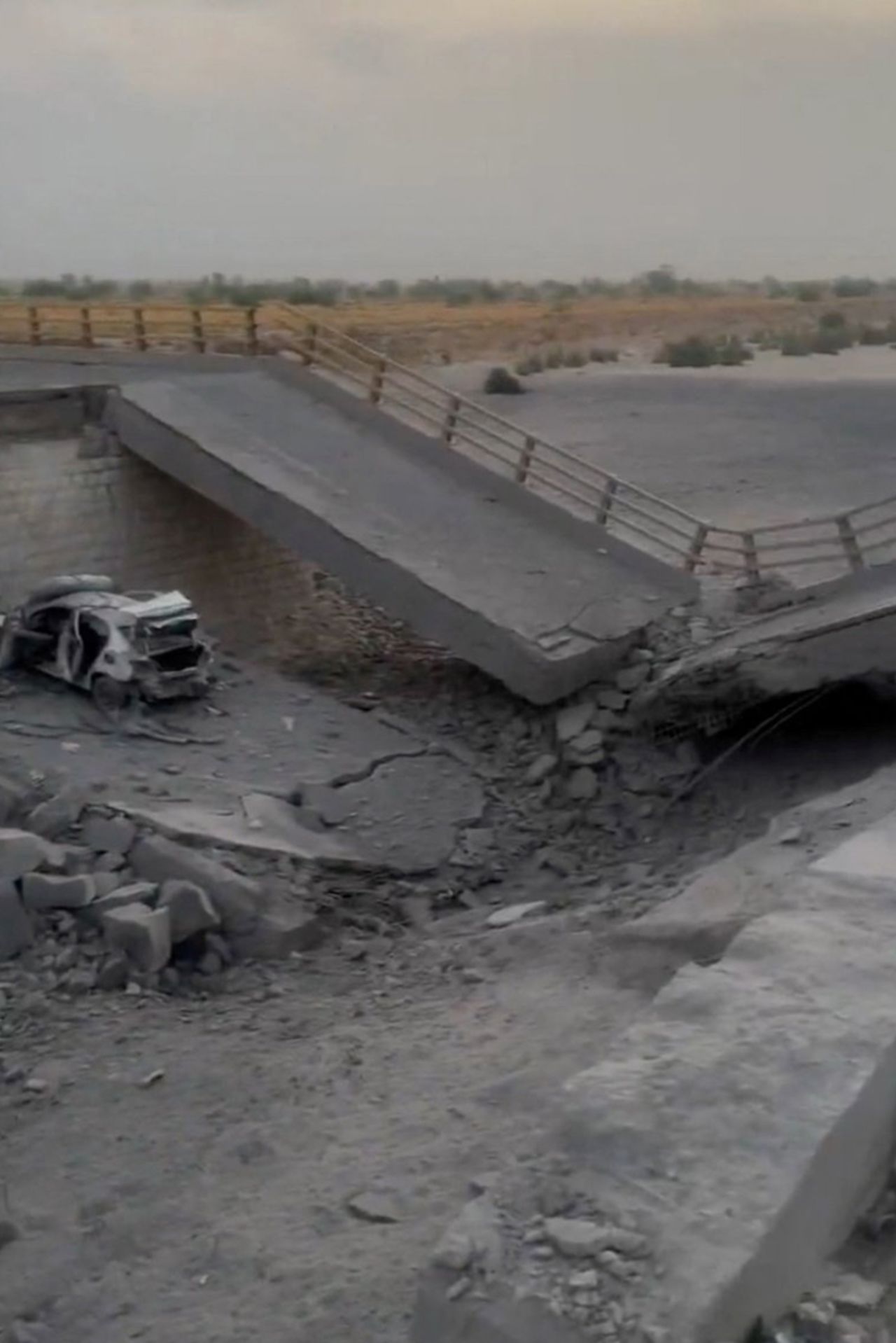 A damaged portion of a bridge in the aftermath of a strike, in Bandar Khamir, Hormozgan province, Iran, on Friday.