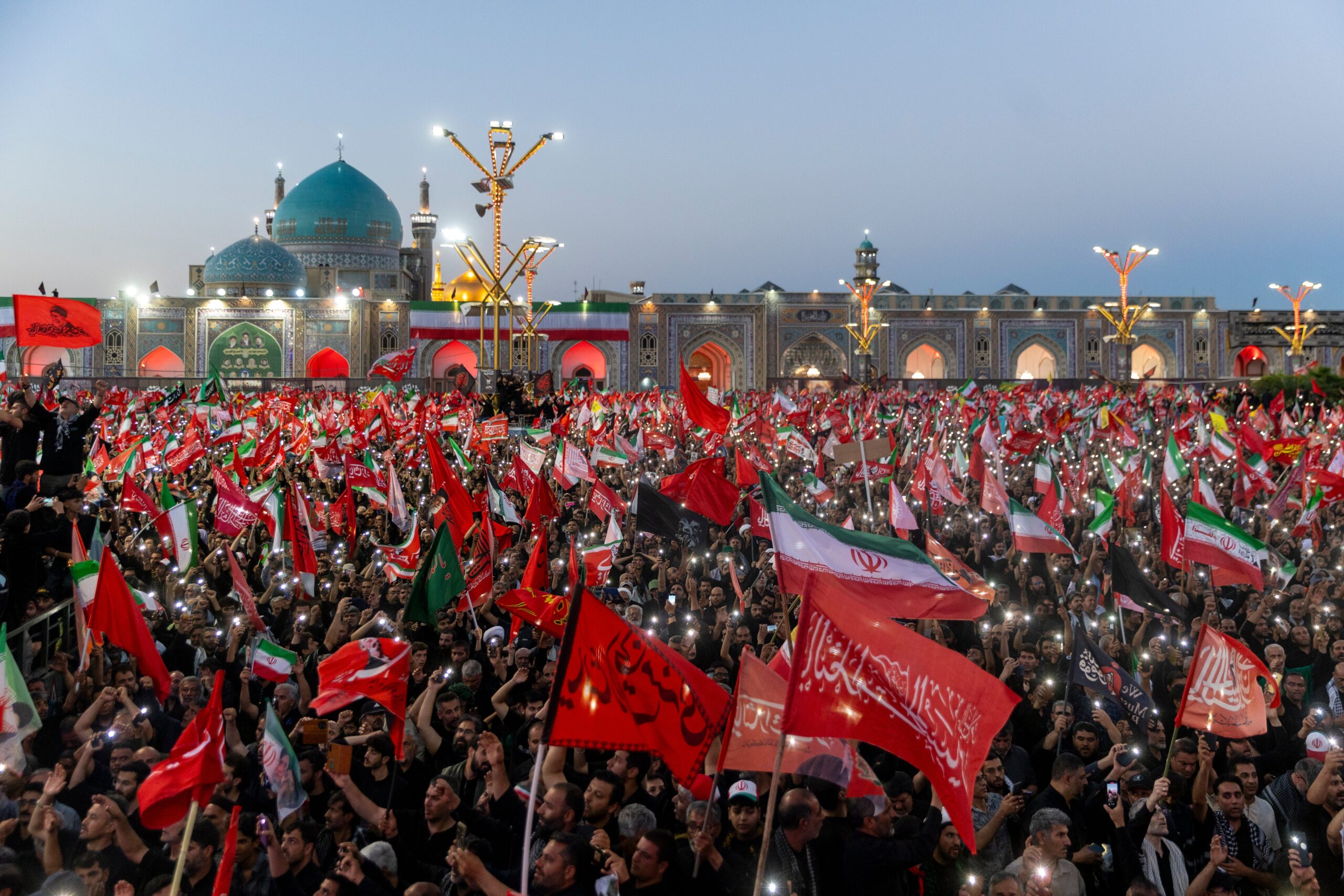Huge crowds gather for the burial of Iran's late supreme leader, Ayatollah Ali Khamenei at the Imam Reza Shrine on July 09, 2026 in Mashhad, Iran