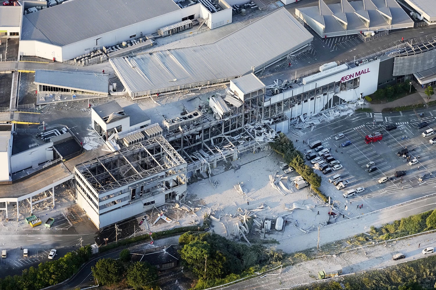 Image: Photo taken from a Kyodo News helicopter on July 28, 2026, shows a partially destroyed Aeon Mall building in Kashima, Kumamoto Prefecture