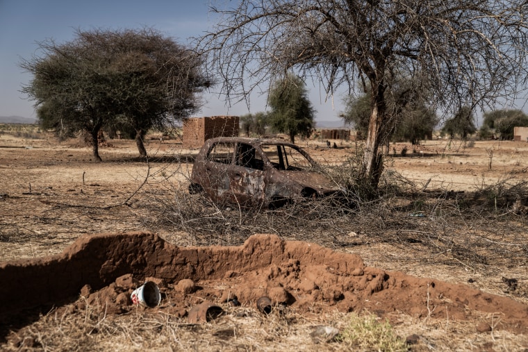 The remains of fighting scar the abandoned African village of Bakri in Sudan.