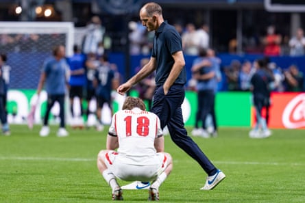 Thomas Tuchel walks past Anthony Gordon, one of the players he substituted, after England’s defeat.
