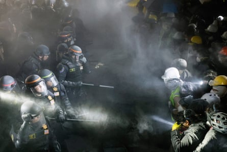police and students facing each other