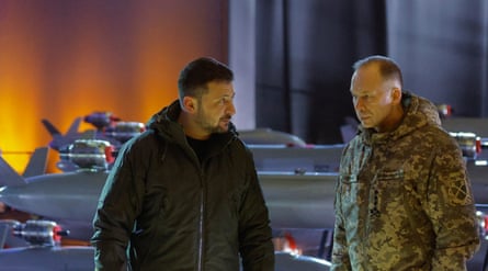 Volodymyr Zelenskyy with Oleksandr Syrskyi, drones in background