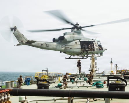 US marines helicopter landing on a tanker