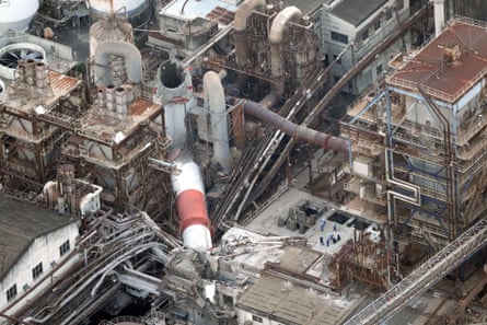 An aerial view shows a collapsed chimney at Nippon Paper Industries’ Yatsushiro paper mill after the earthquake.