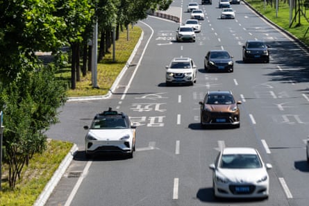A Baidu driverless robotaxi on the streets of Wuhan in 2024.