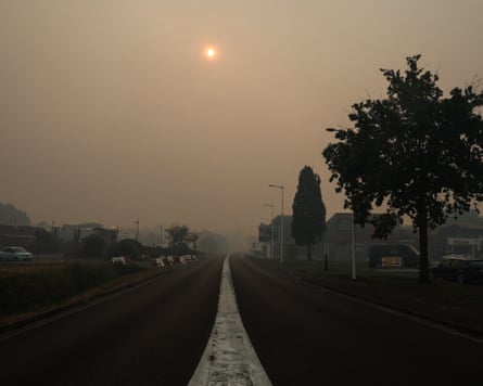 Wildfire smoke shrouds the sky over Biscarrosse in an ash-grey haze