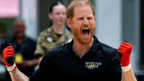 Reuters Prince Harry wearing gloves as as he played wheelchair rugby at an event in Birmingham for the Invictus Games