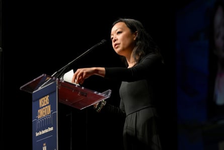 Woman speaks on stage