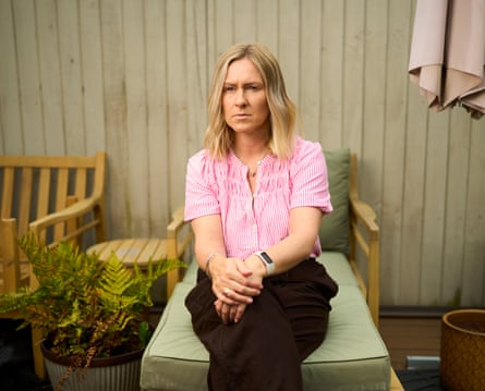 Jane Coates sat in a garden