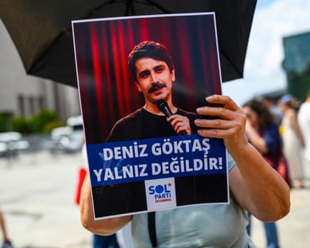 People call for the release of the Turkish comedian Deniz Göktaş in front of a courthouse in Istanbul on Friday.
