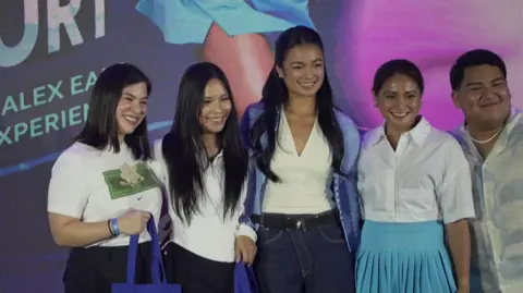 BBC/Virma Simonette Rivera Tennis star Alex Eala poses with fans at a meet and greet in Manila, Philippines