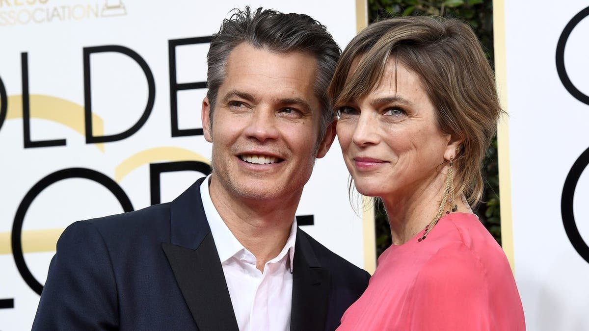 Timothy Olyphant and Alexis Knief arrive at the Beverly Hilton Hotel for the Golden Globe Awards.