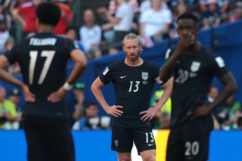U.S. defender Tim Ream, midfielder Malik Tillman  and forward Folarin Balogun reacted after Belgium scored.