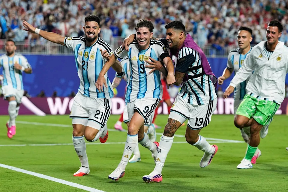 Julian Alvarez celebrates scoring for Argentina against Switzerland (AP)