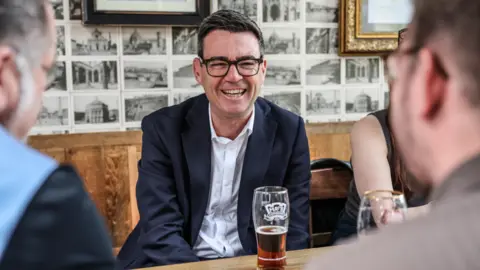 PA Media Prime Minister Andy Burnham during a visit to the Hare pub in Harlow, Essex on 23 July, 2026