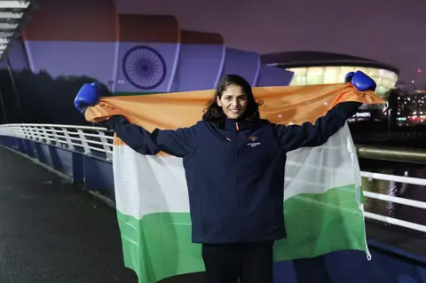Getty Images for Commonwealth Sport Team India boxer Jaismine Lamboria poses in front of The SEC Armadillo as Amdavad is named as host city for the 2030 Centenary Commonwealth Games at the General Assembly on November 26, 2025 in Glasgow, Scotland. (Photo by Ian MacNicol/Getty Images for Commonwealth Sport)