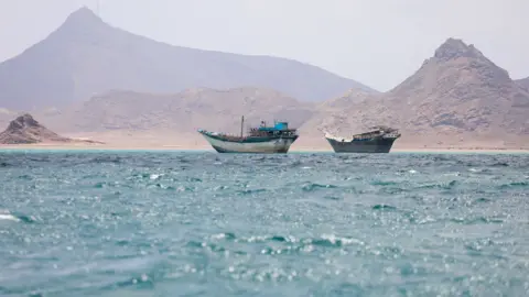 Reuters Boats float near the coast of Bab el-Mandeb, Yemen