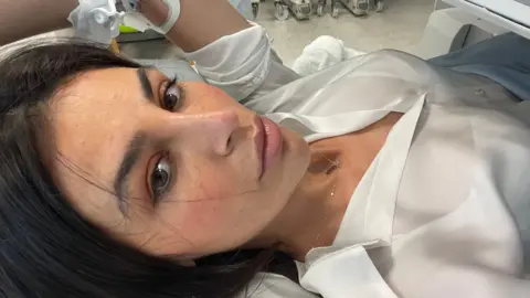Carla Cressy Carla lying on a hospital bed