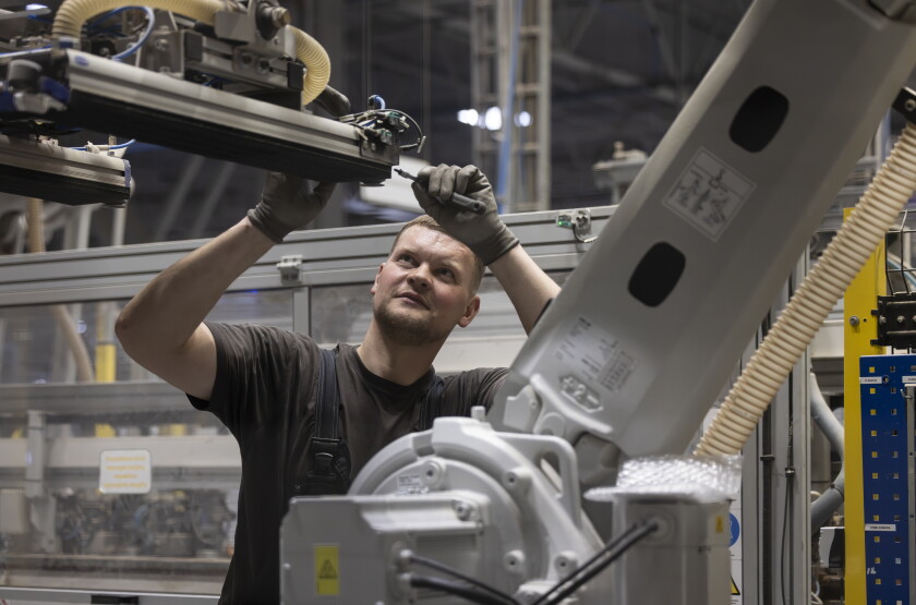 Automated machines build furniture components at Inno Line, a 538,000-square-foot production facility in Klaipėda, Lithuania, on April 22.