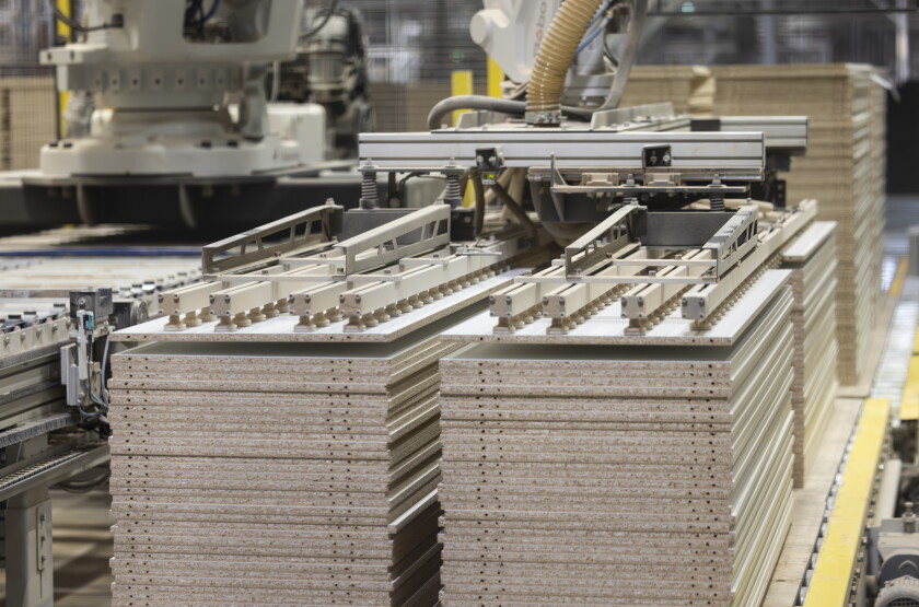 Automated machines build furniture components at Inno Line, a 538,000-square-foot production facility in Klaipėda, Lithuania, on April 22.