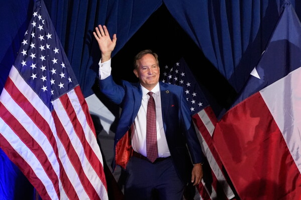 Texas Attorney General Ken Paxton, a Republican candidate for the U.S. Senate, waves as he takes the stage during a primary runoff election night event after winning the Republican party's nomination, May 26, 2026, in Plano, Texas. (AP Photo/Tony Gutierrez, File)