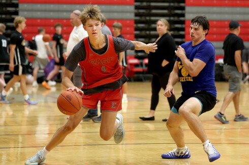 Player dribbles ball.