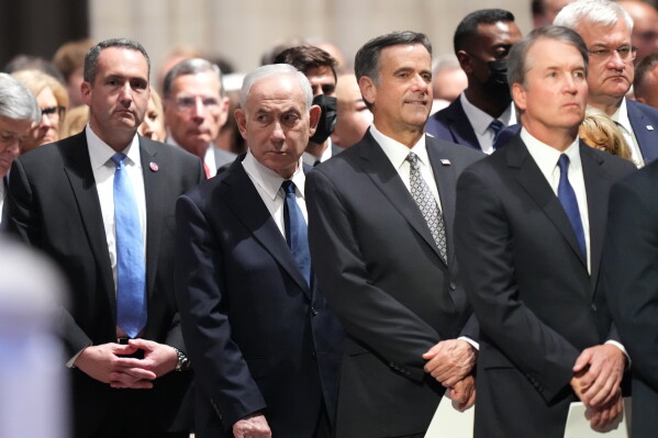 Israel's Prime Minister Benjamin Netanyahu, CIA Director John Ratcliffe and Supreme Court Justice Brett Kavanaugh arrive for the funeral of Sen. Lindsey Graham, R-S.C., at the Washington National Cathedral, Tuesday, July 28, 2026, in Washington. (AP Photo/Alex Brandon)