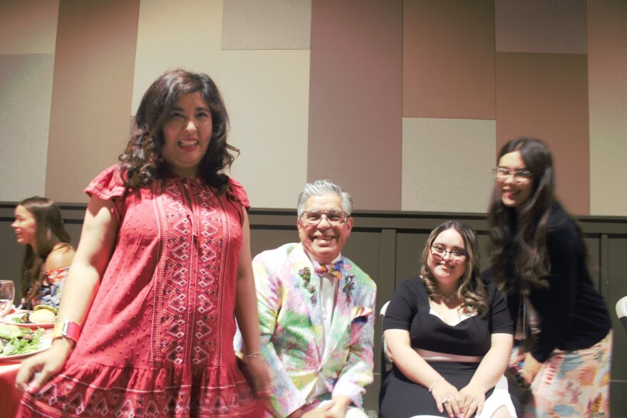 (From left to right) Eva's Hero Marlene Montes, Michael Quintanilla, Eva's Hero model Chelsea Figueroa, and Eva's Hero volunteer Lola Armstrong pose at "Lights, Camera, Fashion."