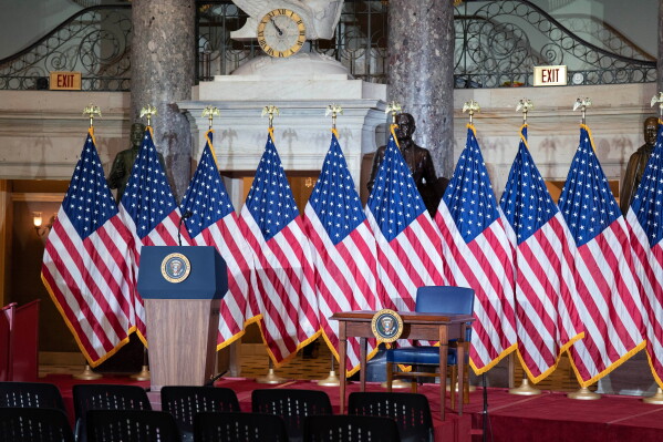 The stage prepared for President Donald Trump signing of the bipartisan Housing Bill is seen on the Capitol Wednesday, June 24, 2026, in Washington. (AP Photo/Jose Luis Magana)