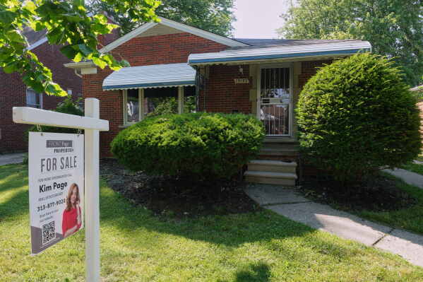 An existing home for sale is shown Tuesday, July 7, 2026, in Detroit. (AP Photo/Paul Sancya)