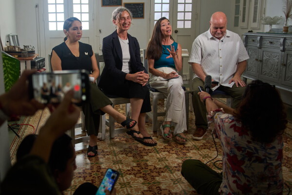 From left, U.S. Representatives Delia C. Ramirez of Illinois, Maxine Dexter of Oregon, Teresa Leger Fernández of New Mexico and Mark Pocan of Wisconsin, all Democrats, hold a news conference in Havana, Cuba, Sunday, July 12, 2026. (AP Photo/Ramon Espinosa)
