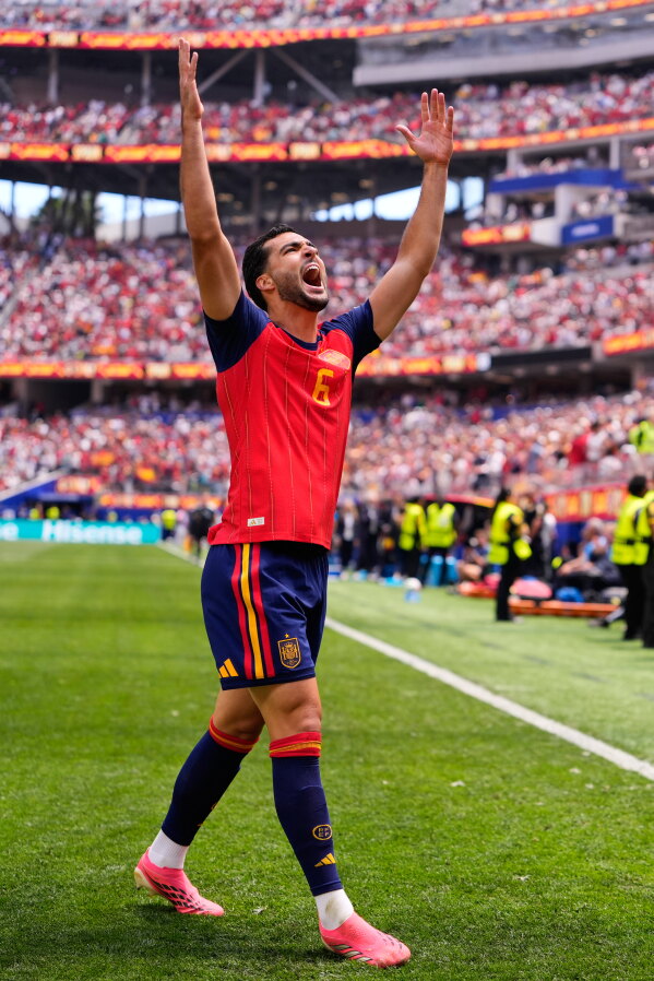 Spain's Mikel Merino (6) celebrates scoring their second goal during the World Cup quarterfinal soccer match between Spain and Belgium in Inglewood, Calif., near Los Angeles, Friday, July 10, 2026. (AP Photo/Mark J. Terrill)