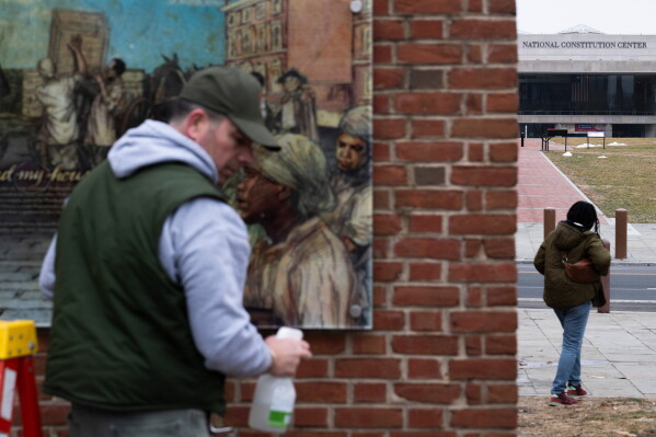 Panels that were part of an exhibit on slavery at the President's House Site in Independence National Historical Park are reinstalled, Feb. 19, 2026, in Philadelphia. (AP Photo/Joe Lamberti, File)