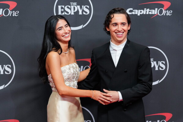 Ana Amelia Batlle Cabral, left, and Marcello Hernández arrive at the ESPY Awards at Lincoln Center on Wednesday, July 15, 2026, in New York. (AP Photo/Yuki Iwamura)